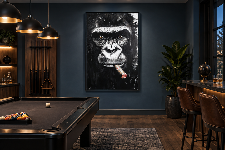 Black and white gorilla smoking a cigar canvas wall art in a dark, modern game room with pool table.