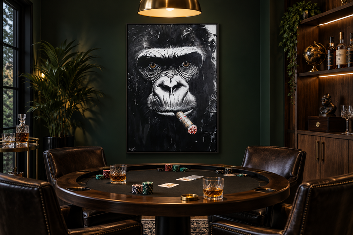Black and white gorilla smoking a cigar canvas wall art in a dark green office with a poker table.