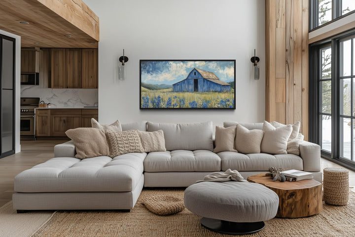Blue Barn and Bluebonnets rustic framed canvas wall decor above a modern sectional sofa.