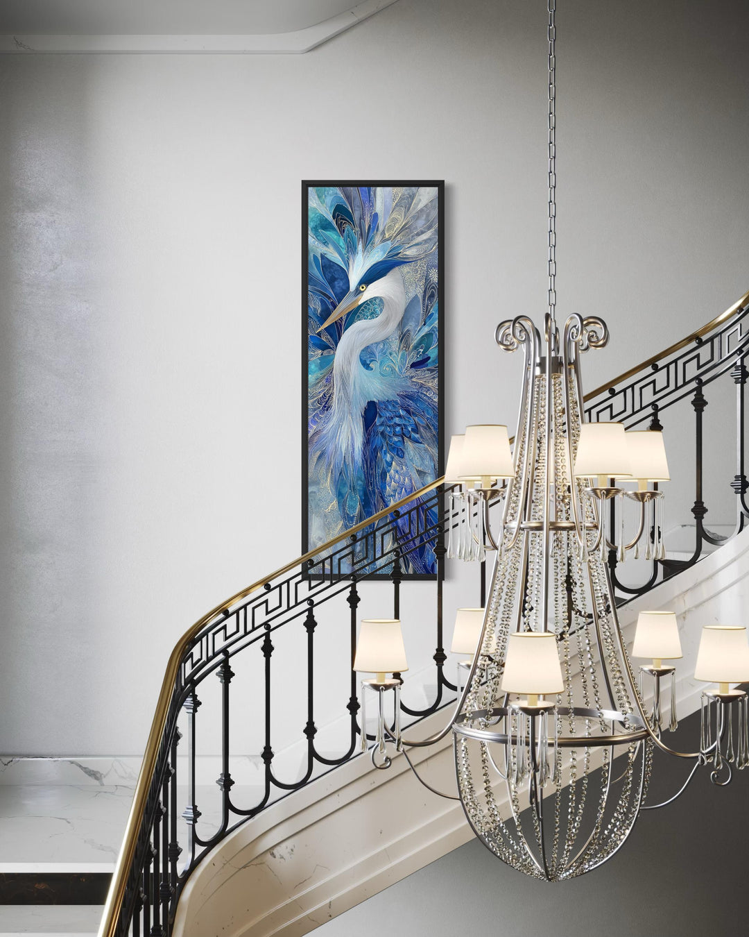 Vertical canvas print of an elegant blue heron in a black frame on a wall by a staircase.
