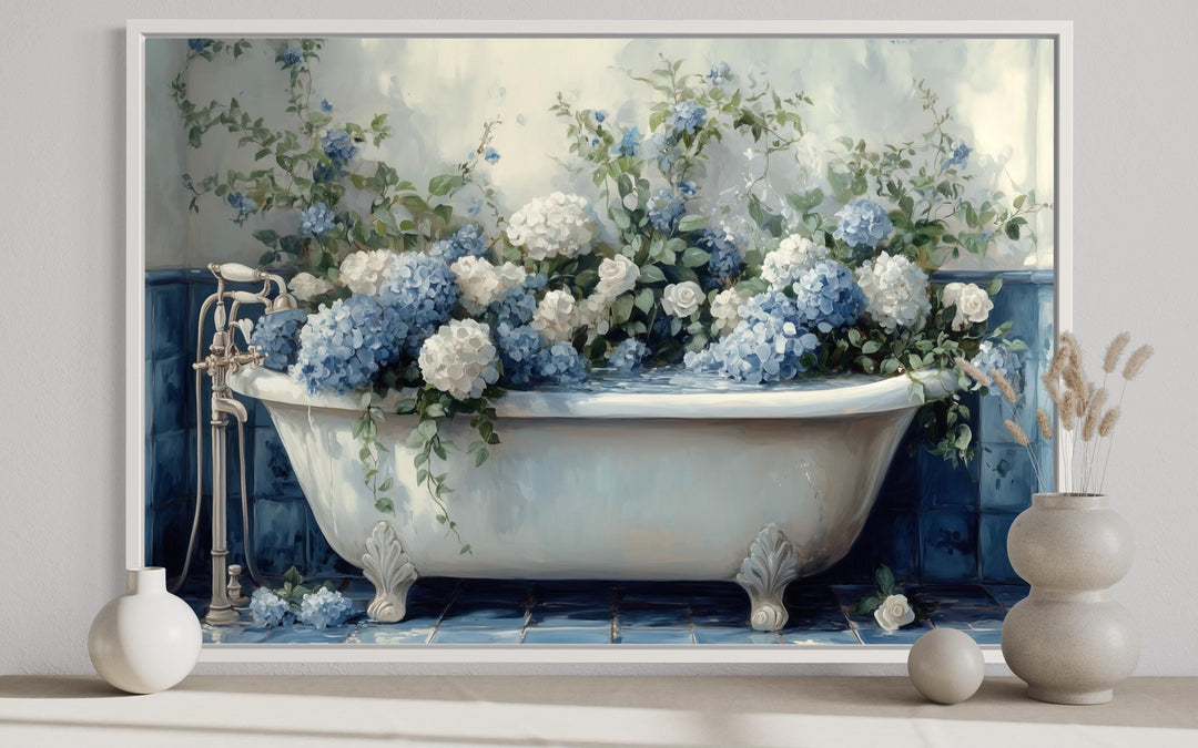 Canvas print of a vintage clawfoot tub filled with blue and white hydrangeas in a blue tiled room.