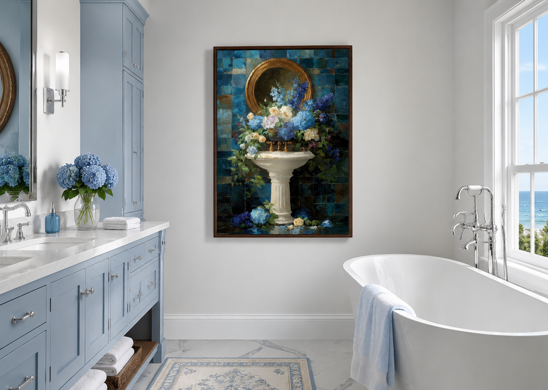 Blue Floral Pedestal Sink wall art in a light blue bathroom with a white tub and marble floors.