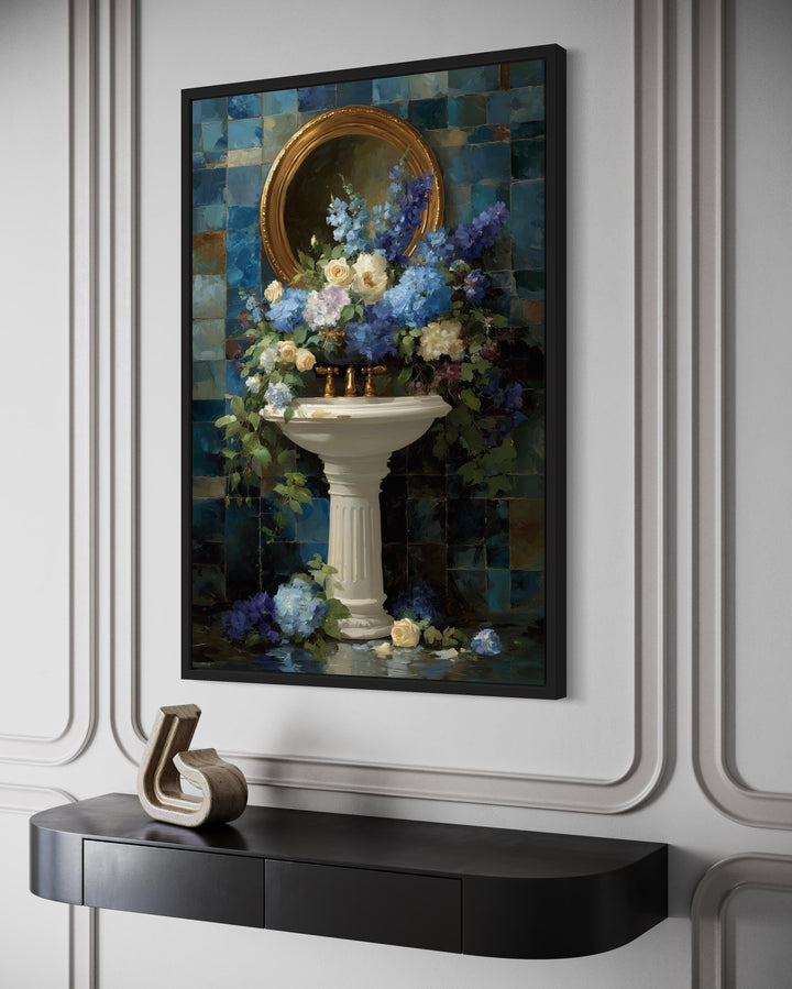 Blue Floral Pedestal Sink Romantic Bathroom Wall Art in a black frame above a black console table.