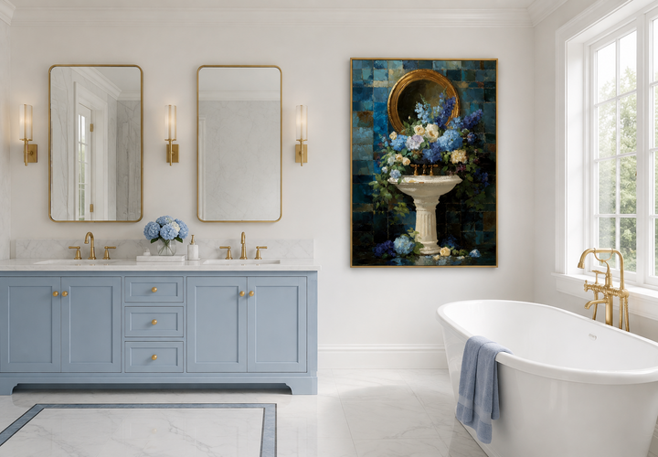 Vertical canvas art of blue flowers around a pedestal sink in a blue and white bathroom.