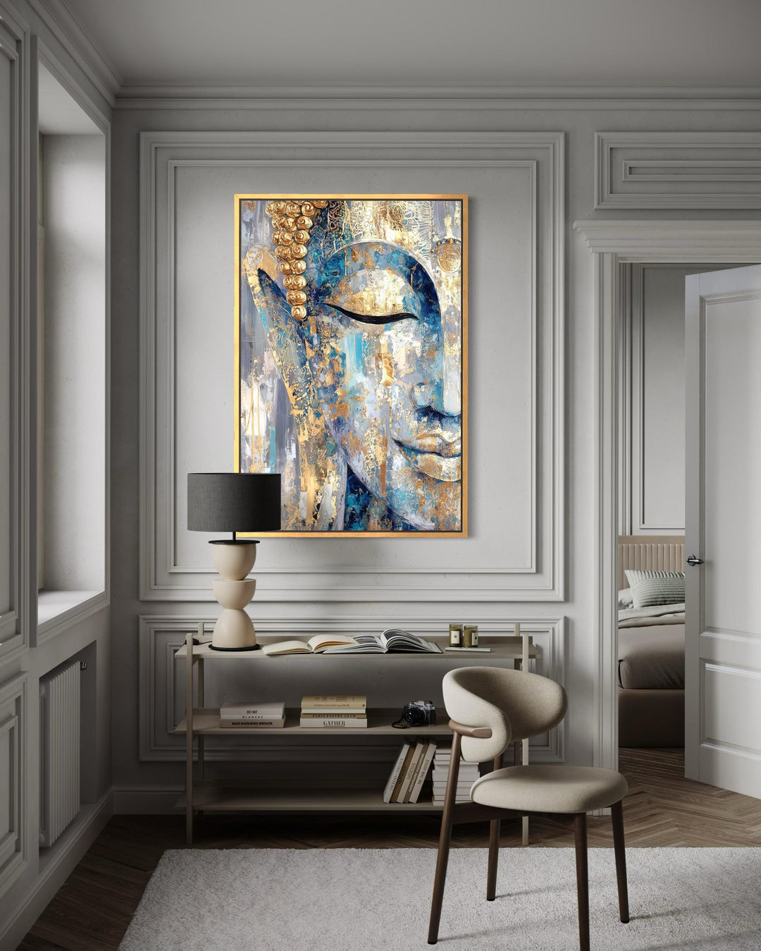 Blue and gold abstract Buddha canvas wall art in a modern living room with a console and chair.