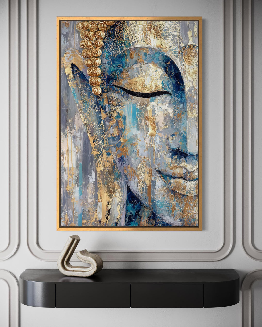 Blue and gold abstract Buddha canvas wall art hanging above a black console table.