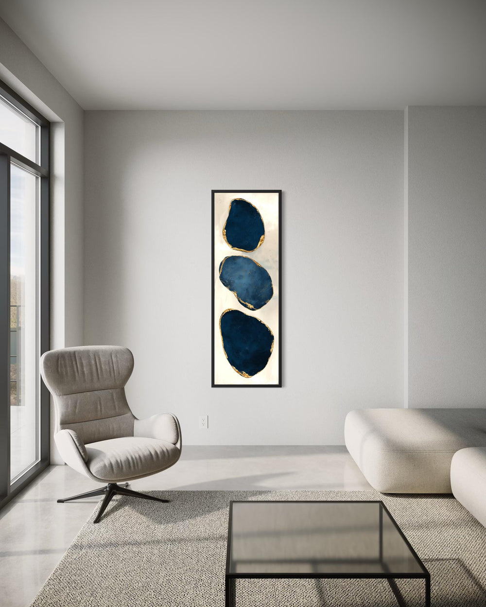 Vertical narrow canvas print featuring three abstract blue stones with gold edges in a black frame.