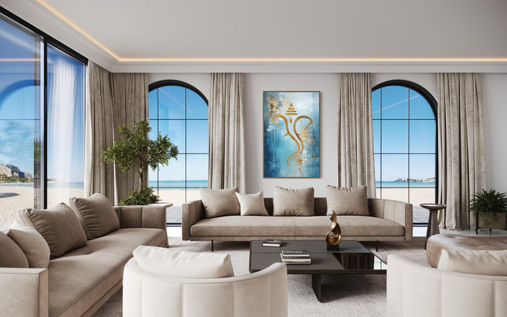 Blue and gold minimalist Lord Ganesha framed canvas wall art in a modern living room setting.