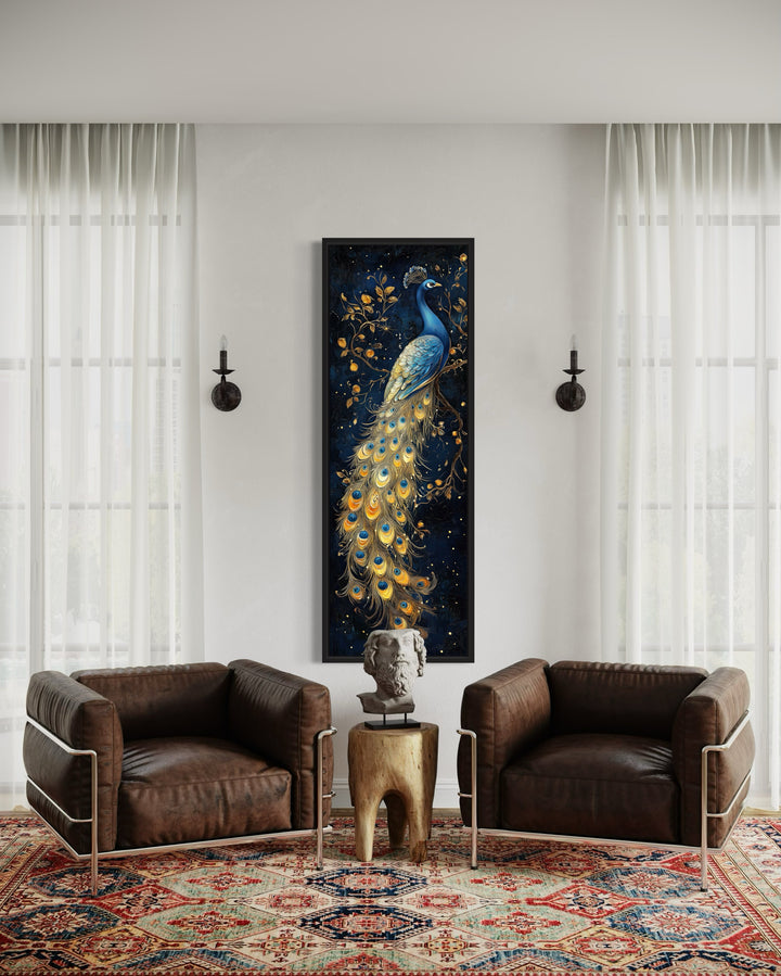 Tall narrow vertical framed canvas wall art featuring a blue and gold peacock on a navy background.