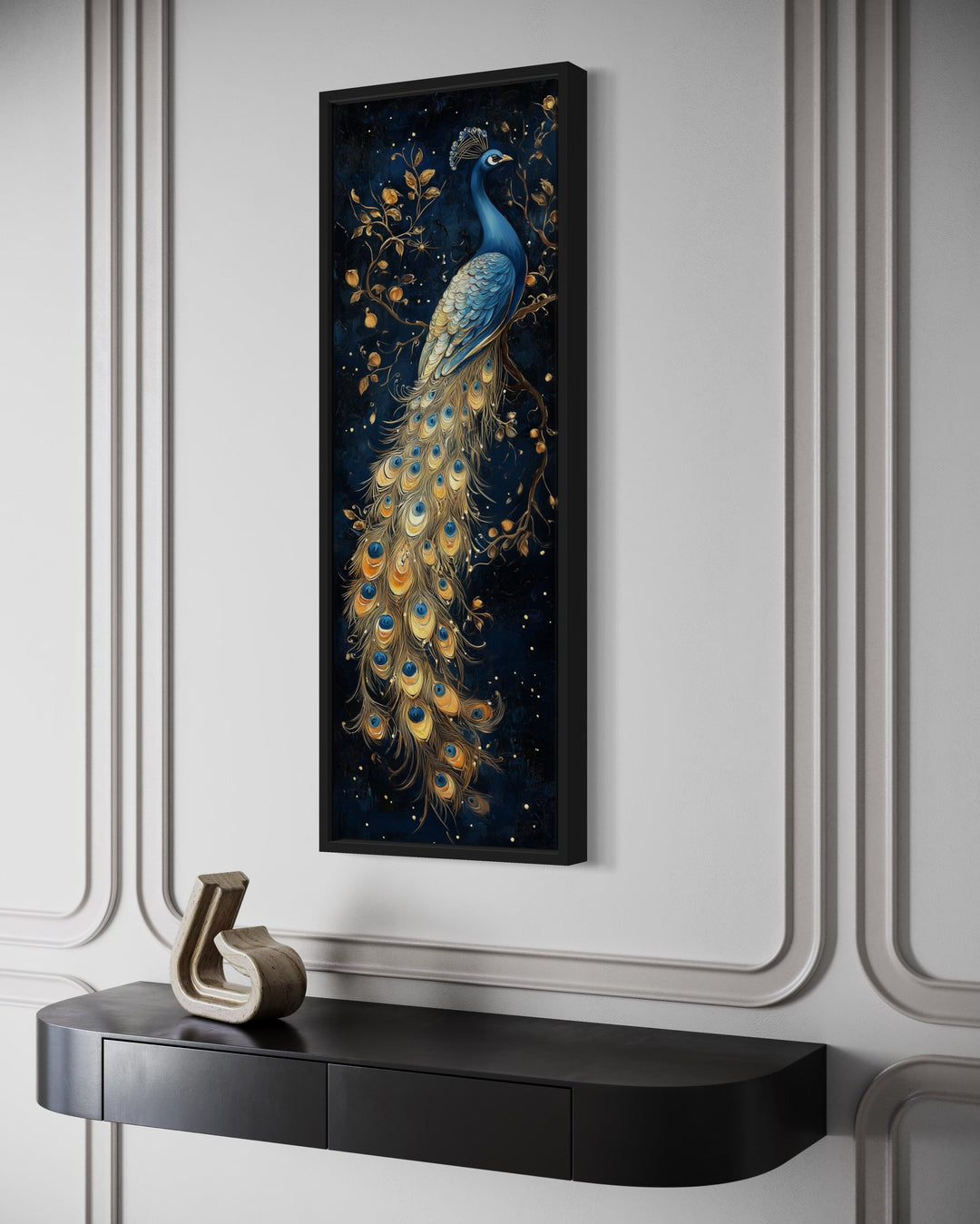 Tall narrow framed canvas wall art featuring a blue and gold peacock on a dark navy background.