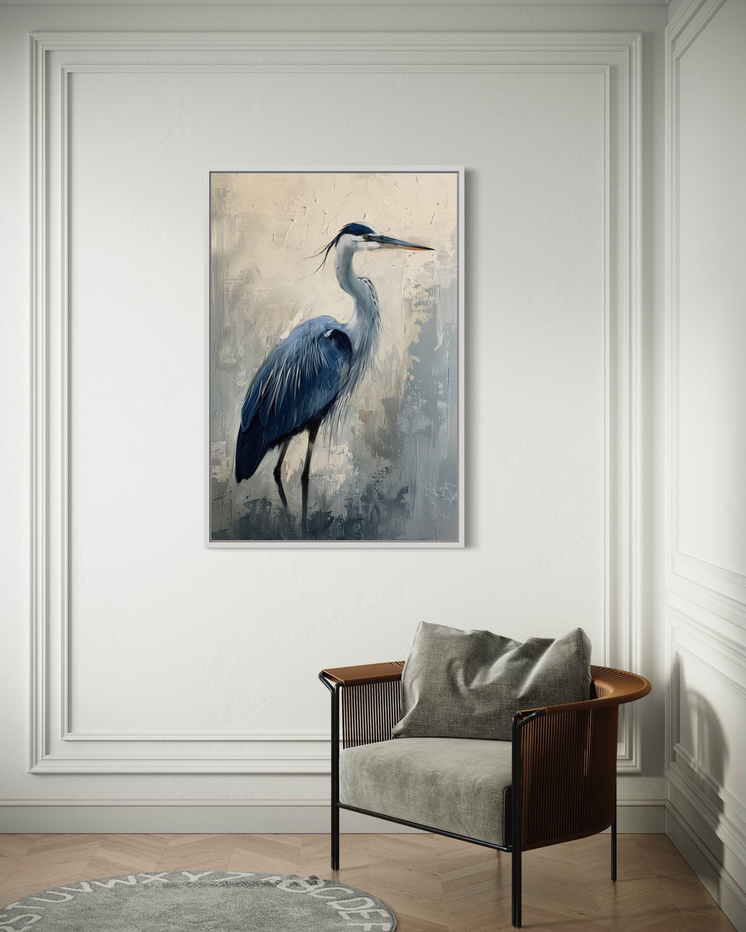 Blue heron abstract painting on framed canvas, displayed on a white wall above a modern chair.