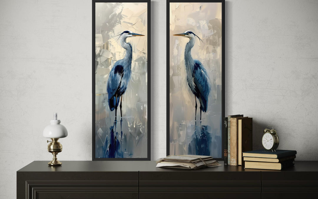 Set of two tall narrow canvas prints featuring blue herons in a modern painterly style.