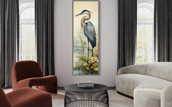 Blue Heron Tall Narrow Vertical Framed Canvas Wall Art in a modern living room setting.