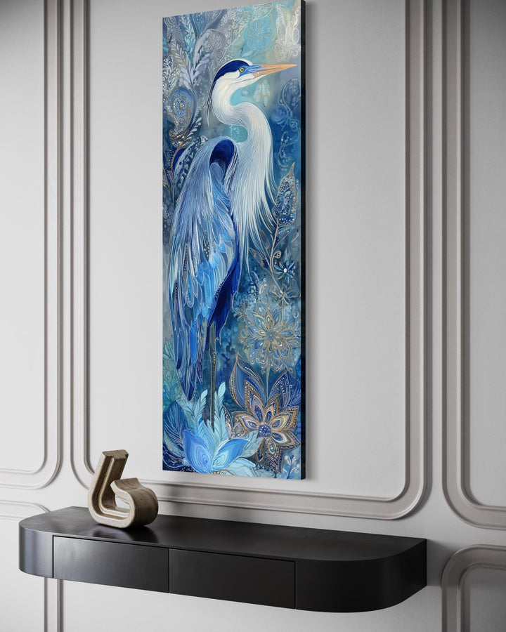 Tall narrow canvas print of a blue heron with intricate floral patterns in elegant blue tones.