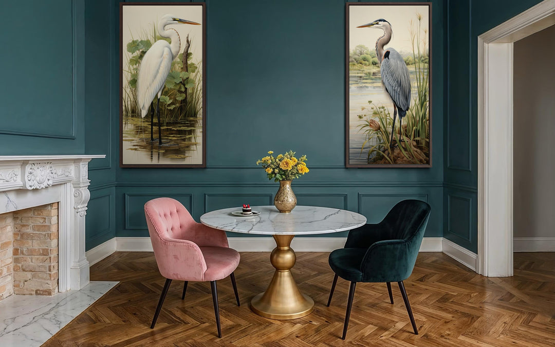 Set of two canvas wall art panels featuring a blue heron and a white egret in lush marsh habitats.