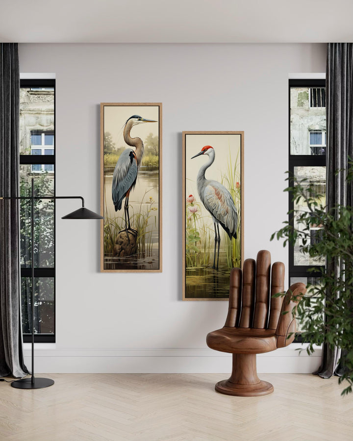 Tall vertical set of two canvas wall art pieces featuring a blue heron and a sandhill crane.