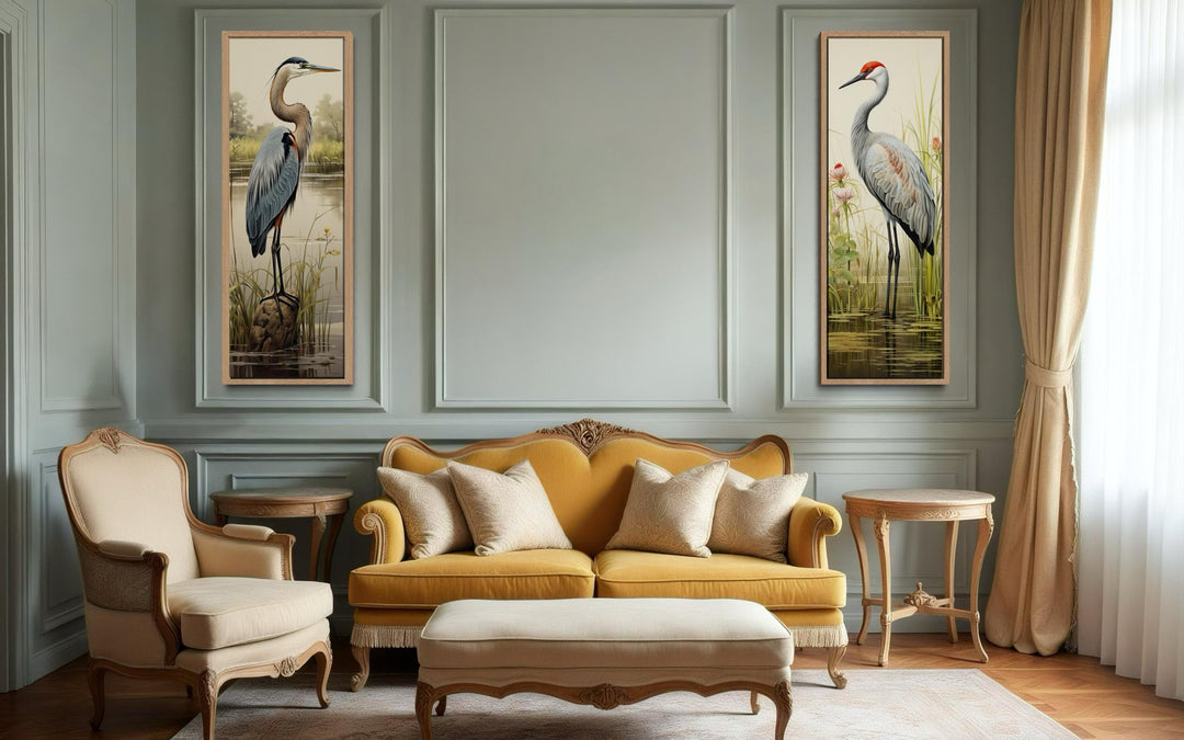 Set of two tall vertical canvas wall art pieces featuring a blue heron and a sandhill crane.