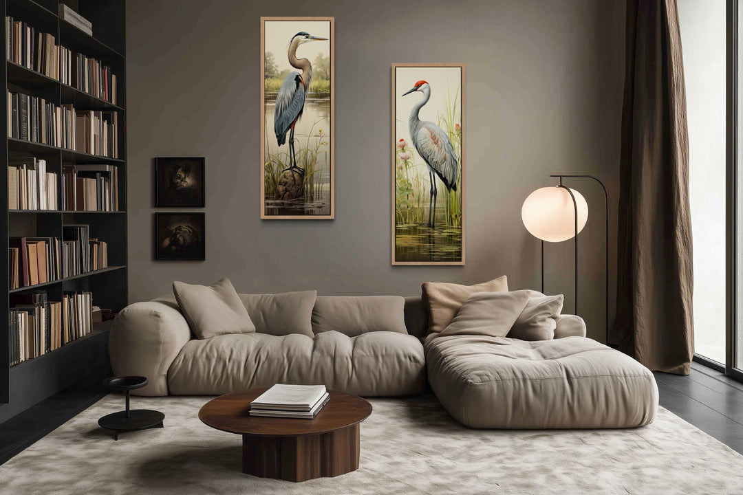 Set of two tall vertical canvas wall art pieces featuring a blue heron and a sandhill crane.