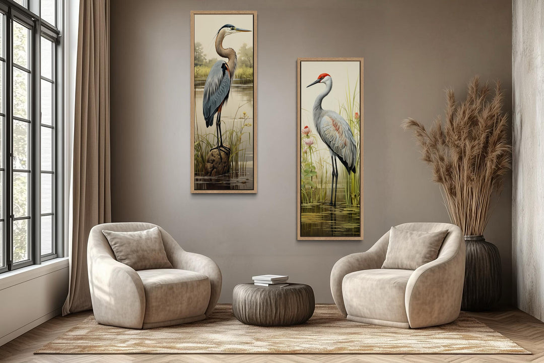 Set of two tall vertical canvas wall art pieces featuring a blue heron and a sandhill crane.