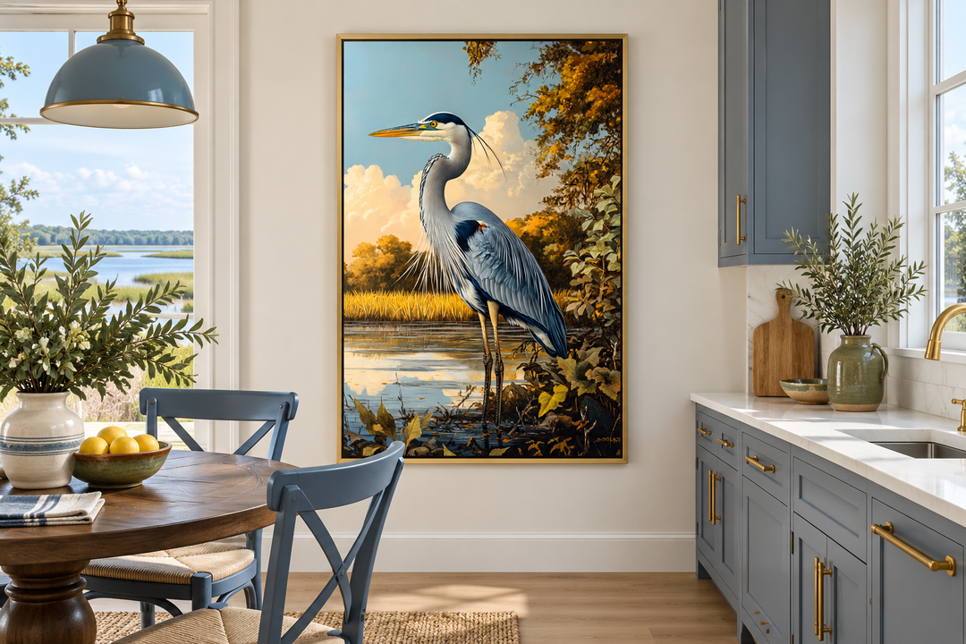 Great Blue Heron in Marshland framed canvas wall art hanging in a coastal-style kitchen.