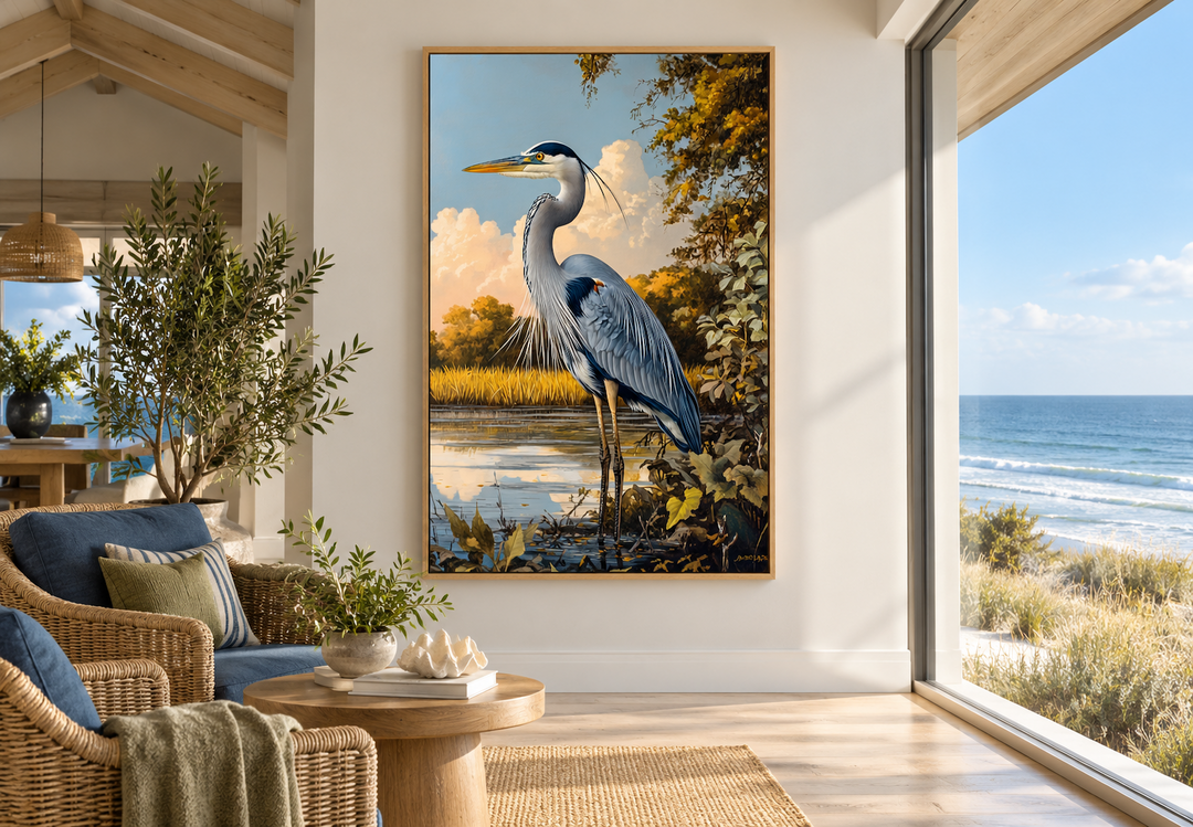 Great Blue Heron in marshland framed canvas wall art in a coastal sunroom with ocean views.