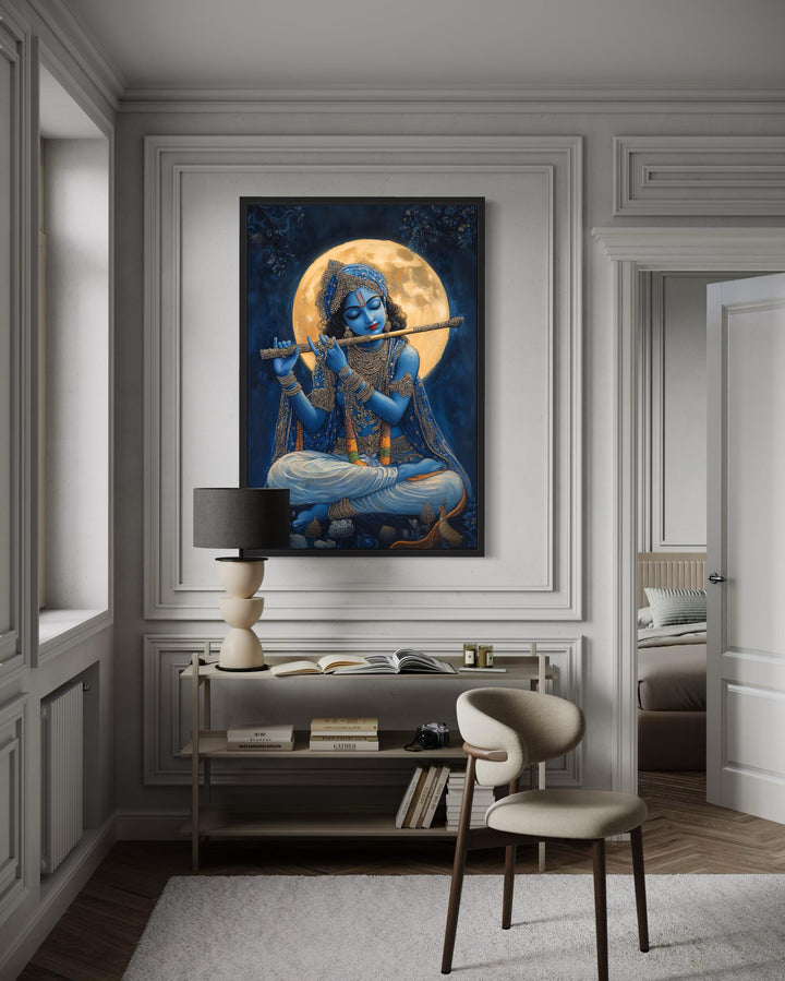 Blue Krishna playing a flute under a full moon, framed canvas wall art in a modern room setting.