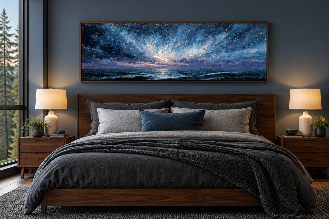 Panoramic blue and purple seascape painting above a wooden bed in a modern, moody bedroom.