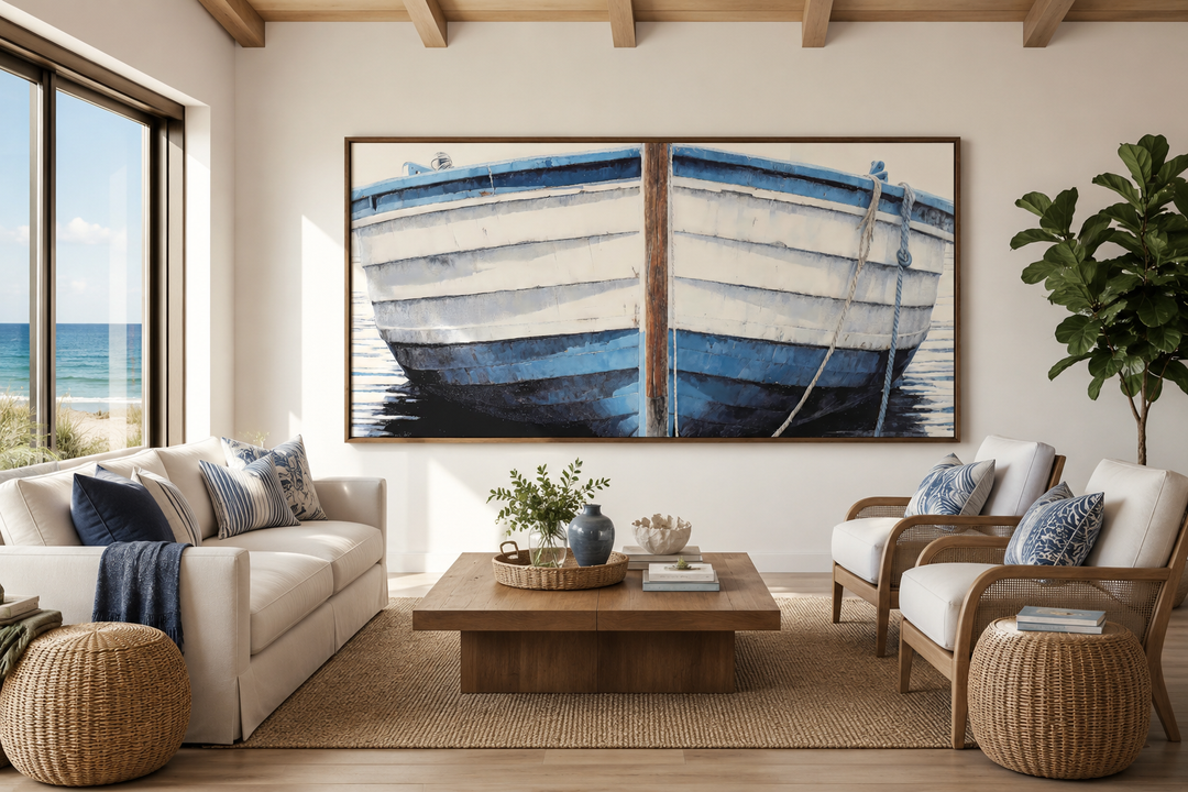 Large horizontal canvas wall art of a rustic blue and white boat in a coastal living room.