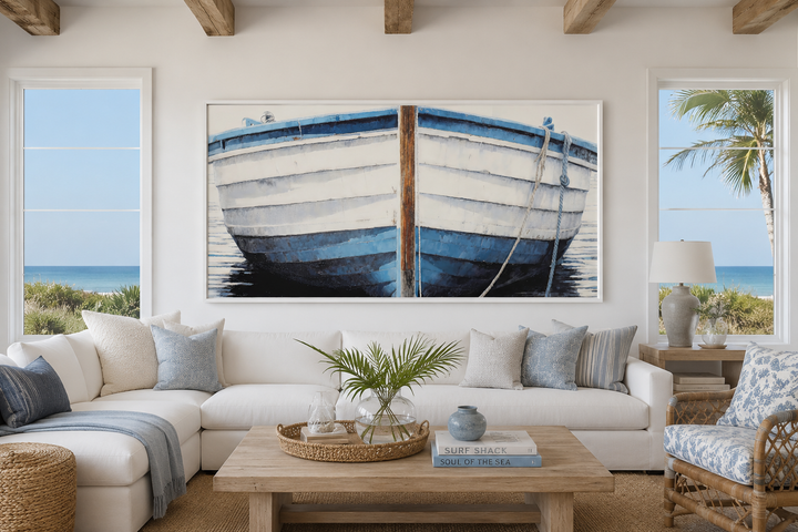 Extra large blue and white rustic boat painting canvas wall art in a coastal living room.