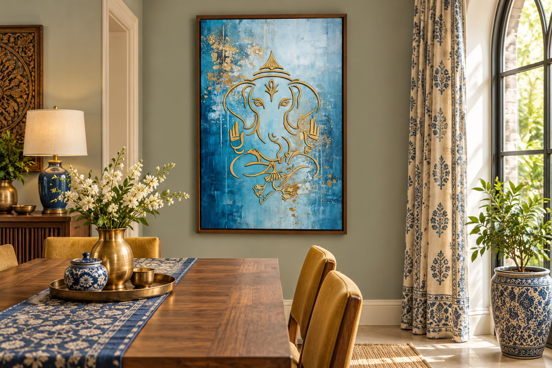 Blue and gold Lord Ganesha canvas wall art in a walnut frame hanging in a dining room.