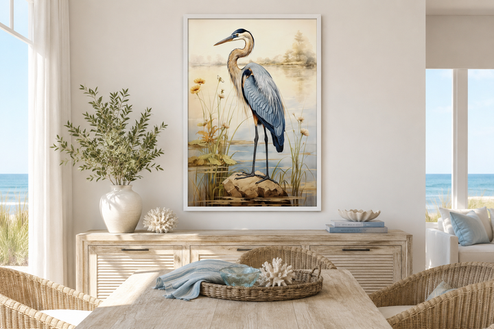 Blue Heron vintage framed coastal canvas wall art hanging in a beach house dining room.