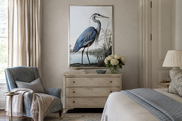 Blue Heron Painting Coastal Framed Canvas Wall Art hanging above a dresser in a bedroom.