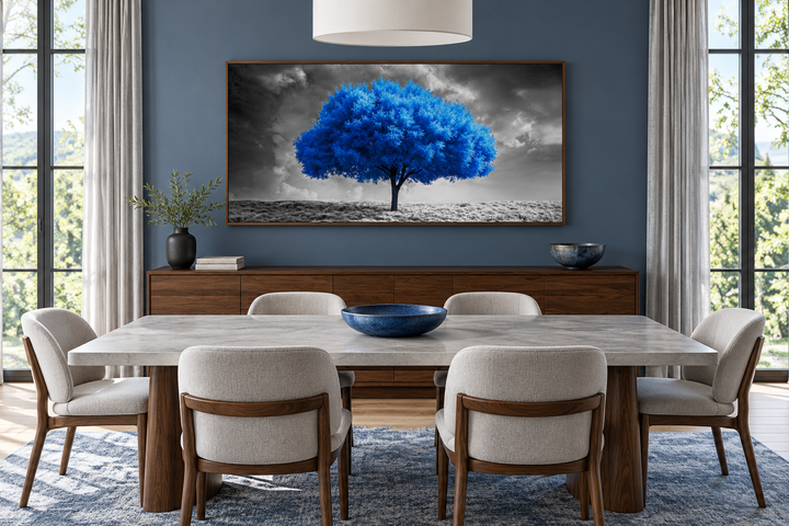 Blue tree on black and white background framed canvas wall art in a modern dining room.