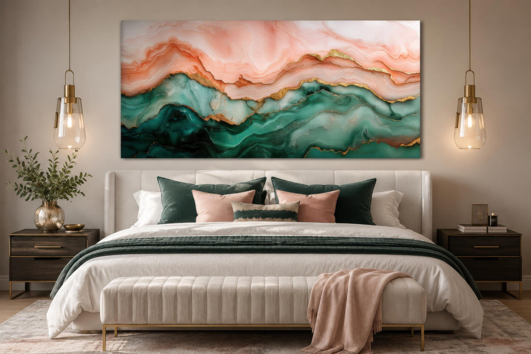 Blush pink and teal green abstract marble canvas wall art with gold veins above a bedroom headboard.