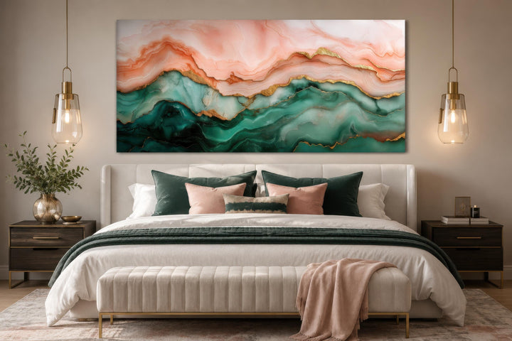 Blush pink and teal green abstract marble canvas wall art with gold veins above a bedroom headboard.