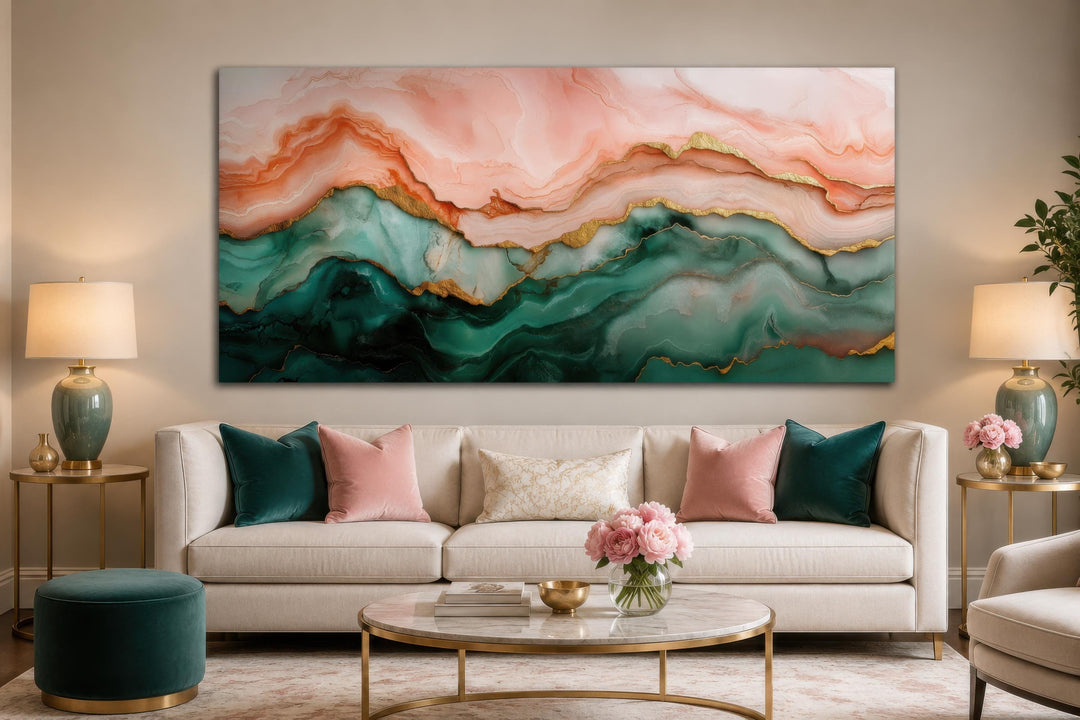 Large horizontal abstract marble canvas art with blush pink, teal green, and gold veins above a sofa.