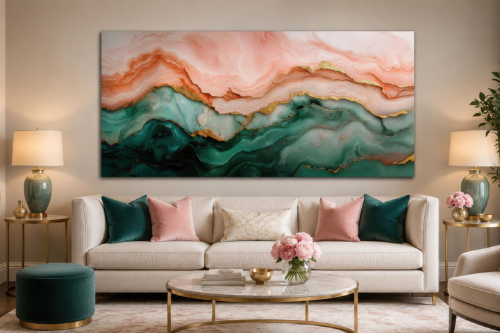 Large horizontal abstract marble canvas art with blush pink, teal green, and gold veins above a sofa.