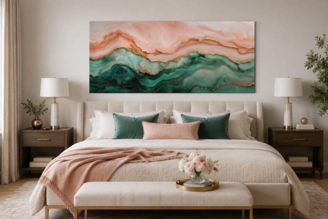 Blush pink and teal green abstract marble canvas wall art with gold veins above a bedroom headboard.
