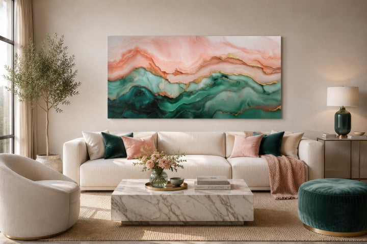Blush pink and green abstract marble canvas wall art with gold veins above a white sofa.