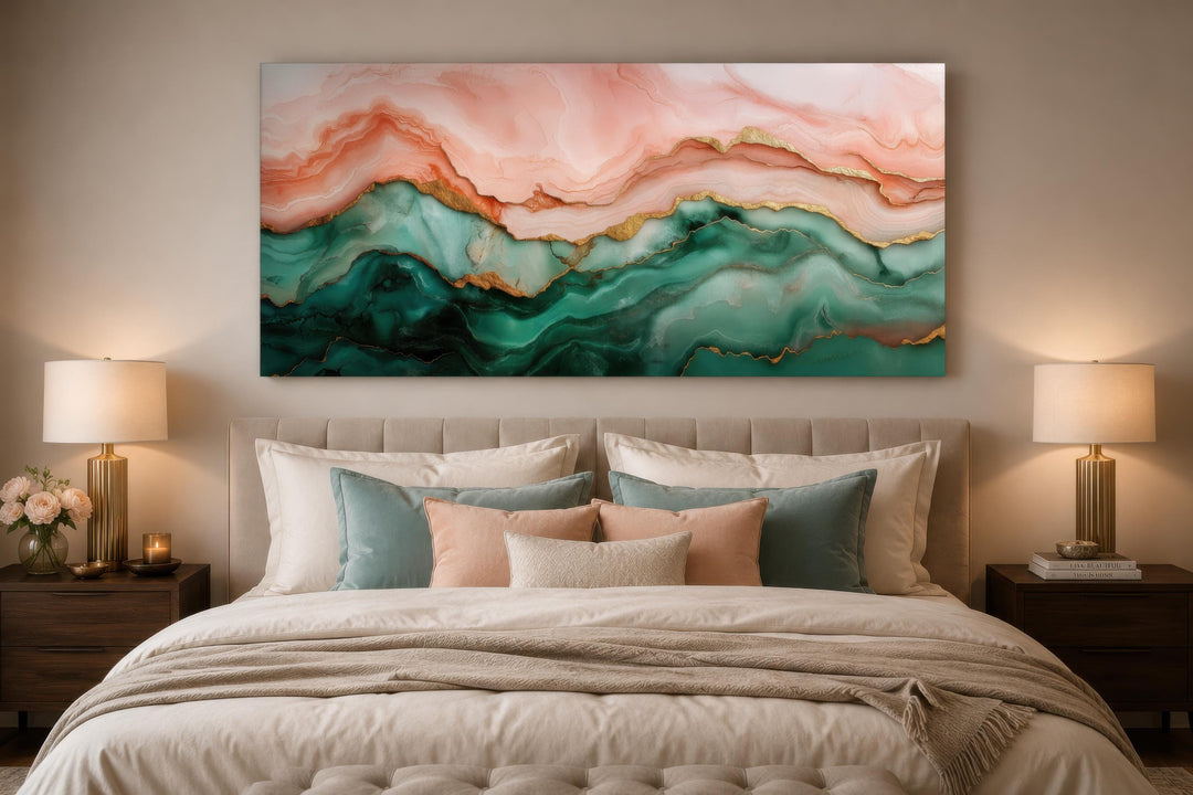 Horizontal abstract canvas art with blush pink, teal green, and gold veins above a bed.