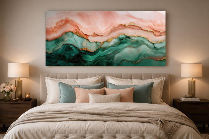 Horizontal abstract canvas art with blush pink, teal green, and gold veins above a bed.