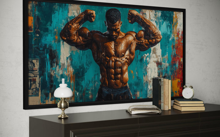 Framed canvas art of a bodybuilder flexing with a graffiti-inspired background.