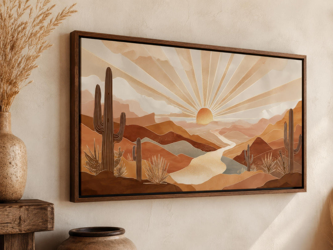 Framed boho desert sunset canvas print featuring saguaro cacti and radiating sun rays.