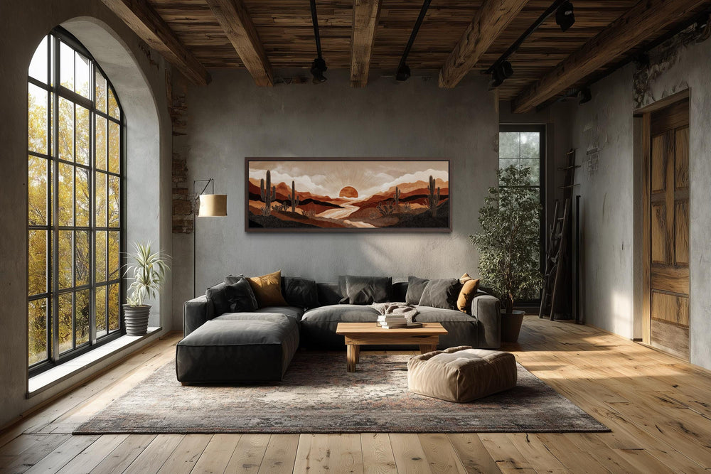 Boho desert sunset with cactus long horizontal canvas wall art in a rustic living room.