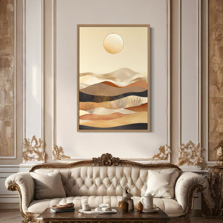 Boho desert vertical mid-century modern framed canvas wall art in neutral colors above a sofa.