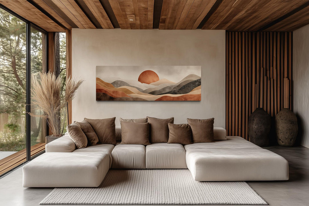 Long horizontal canvas print of a boho desert landscape with a terracotta sun over rolling hills.