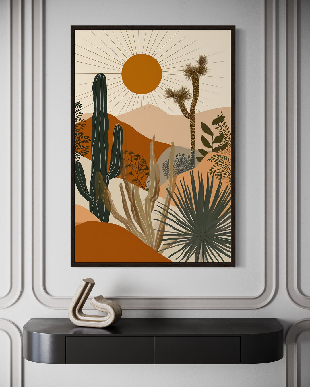 Boho saguaro cactus and sun desert landscape framed canvas wall art above a black console table.