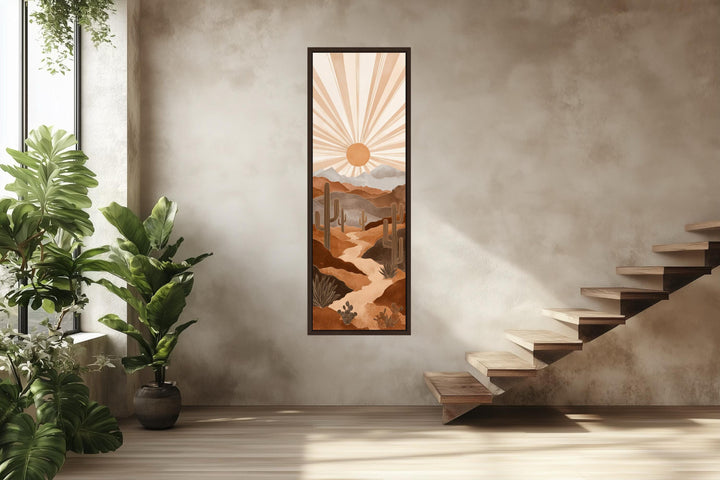 Tall narrow canvas art featuring a boho desert landscape with saguaro cacti and a radiating sun.
