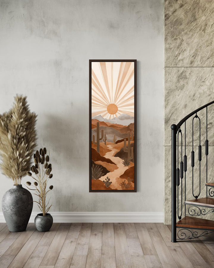 Tall narrow canvas art featuring a boho desert landscape with saguaro cacti and a radiating sun.