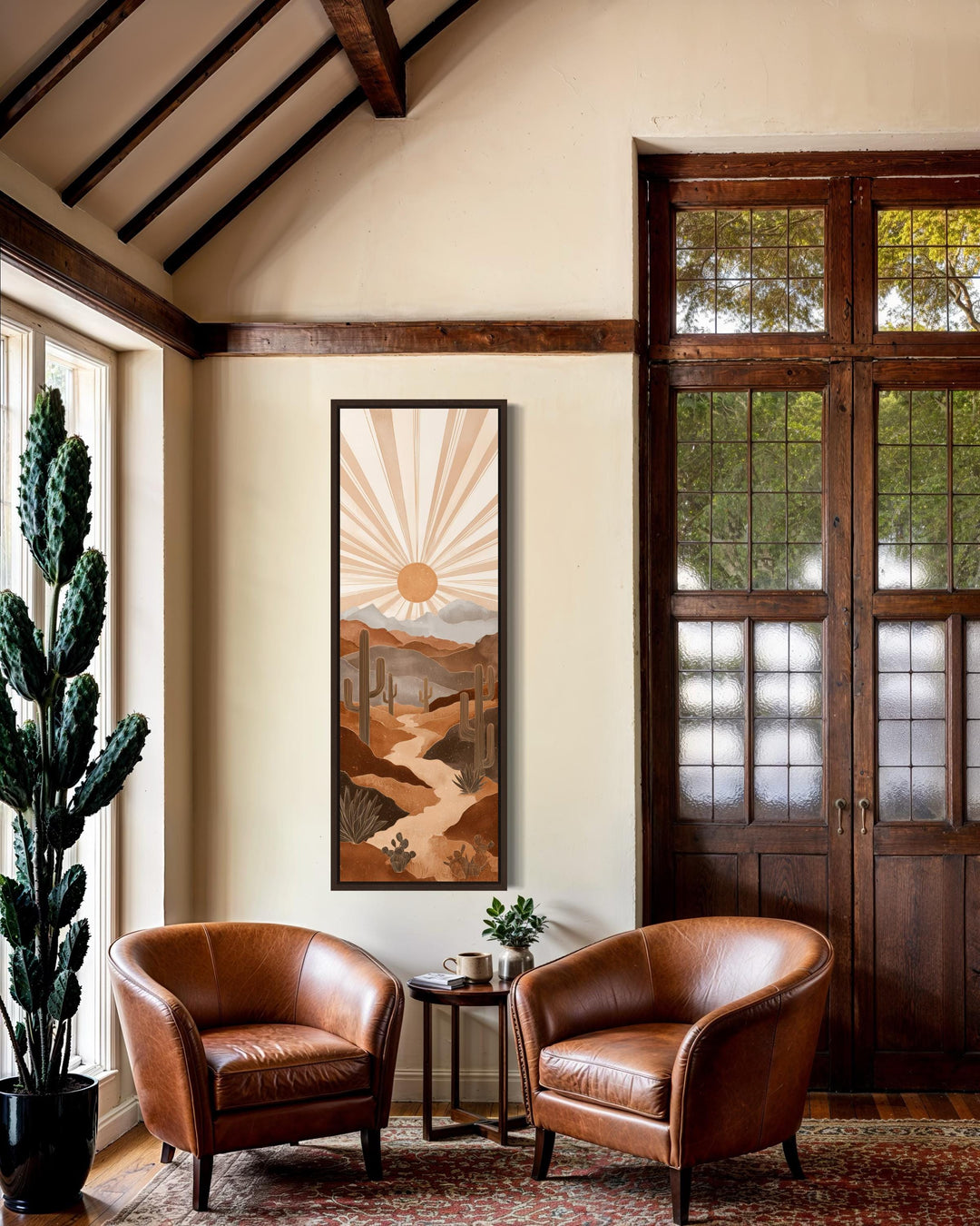 Tall narrow canvas wall art featuring a boho saguaro desert landscape in warm terracotta tones.